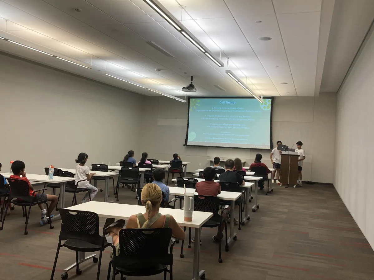 Students learning in our science class